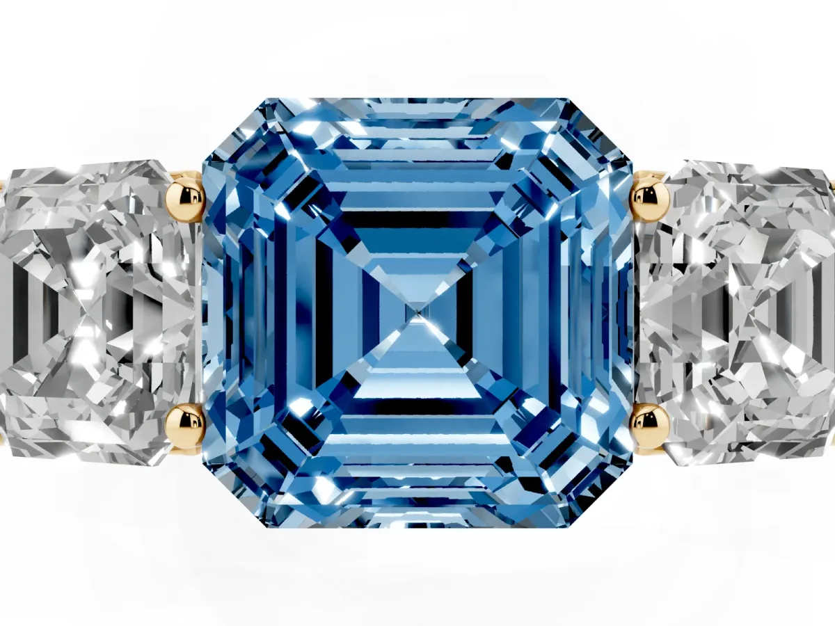 Fancy Blue Asscher Cut Three-Stone Diamond Ring with Prong Setting on a Classic Band Yellow gold