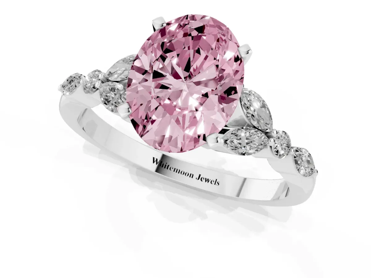 Fancy Pink Oval Cut Diamond Solitaire Ring with Side Stones and Four-Prong Setting Silver