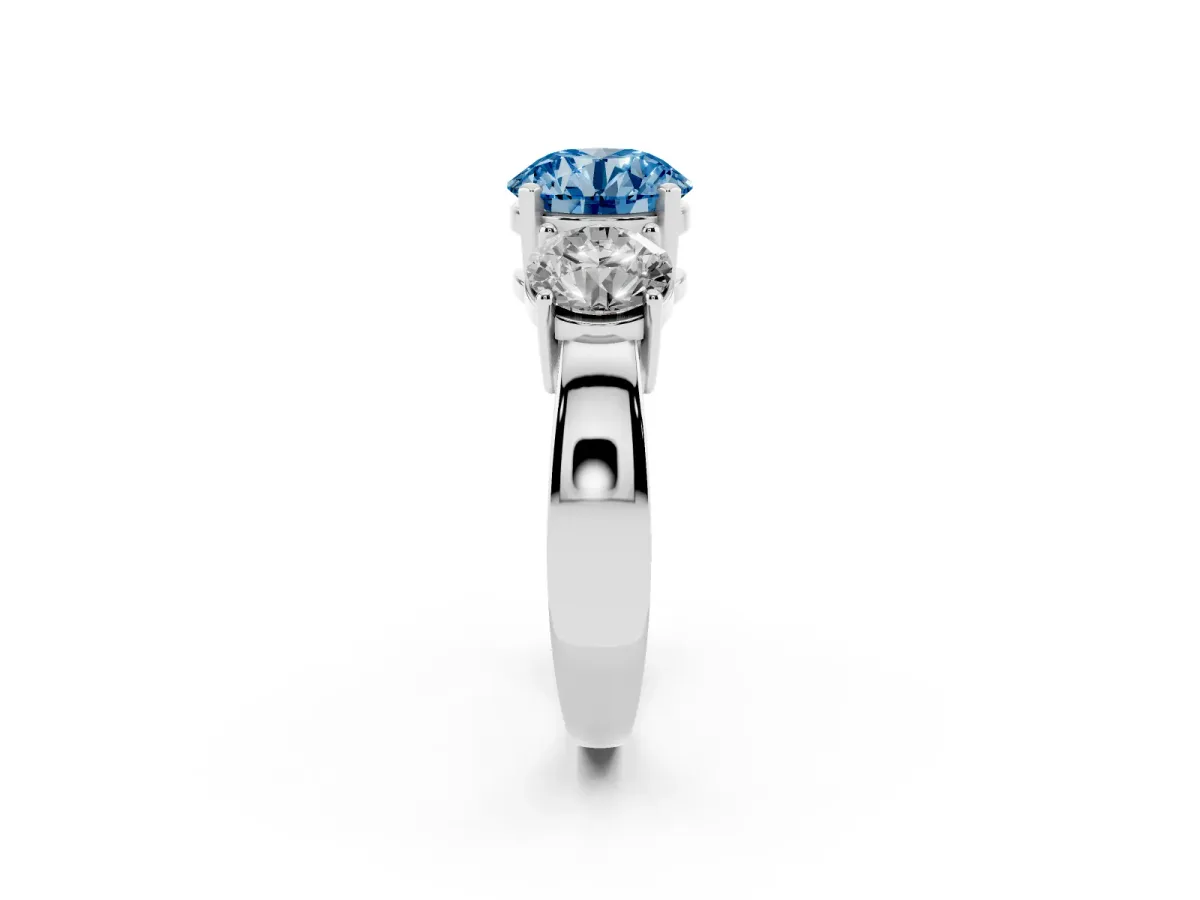 Fancy Blue Three-Stone Round Cut Diamond Ring with Round Side Stones, Classic Band, and Four-Prong Setting White gold