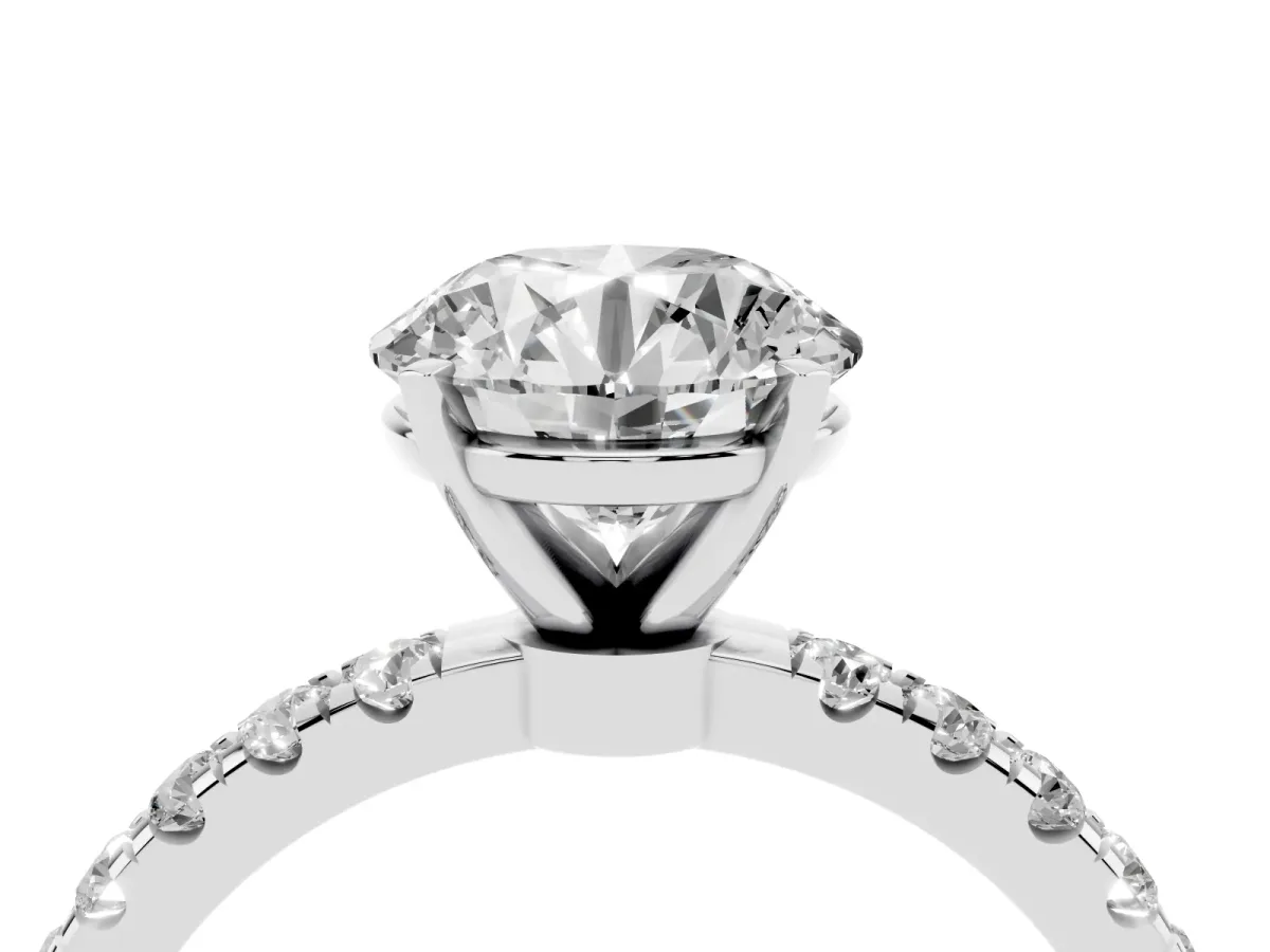 Round Cut Diamond Solitaire Ring with Pavé Accents and Four-Prong Setting Silver