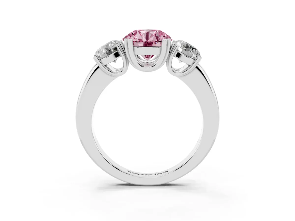 Fancy Pink Three-Stone Round Cut Cut Diamond Ring with Channel Set Band and Four-Prong Setting Silver