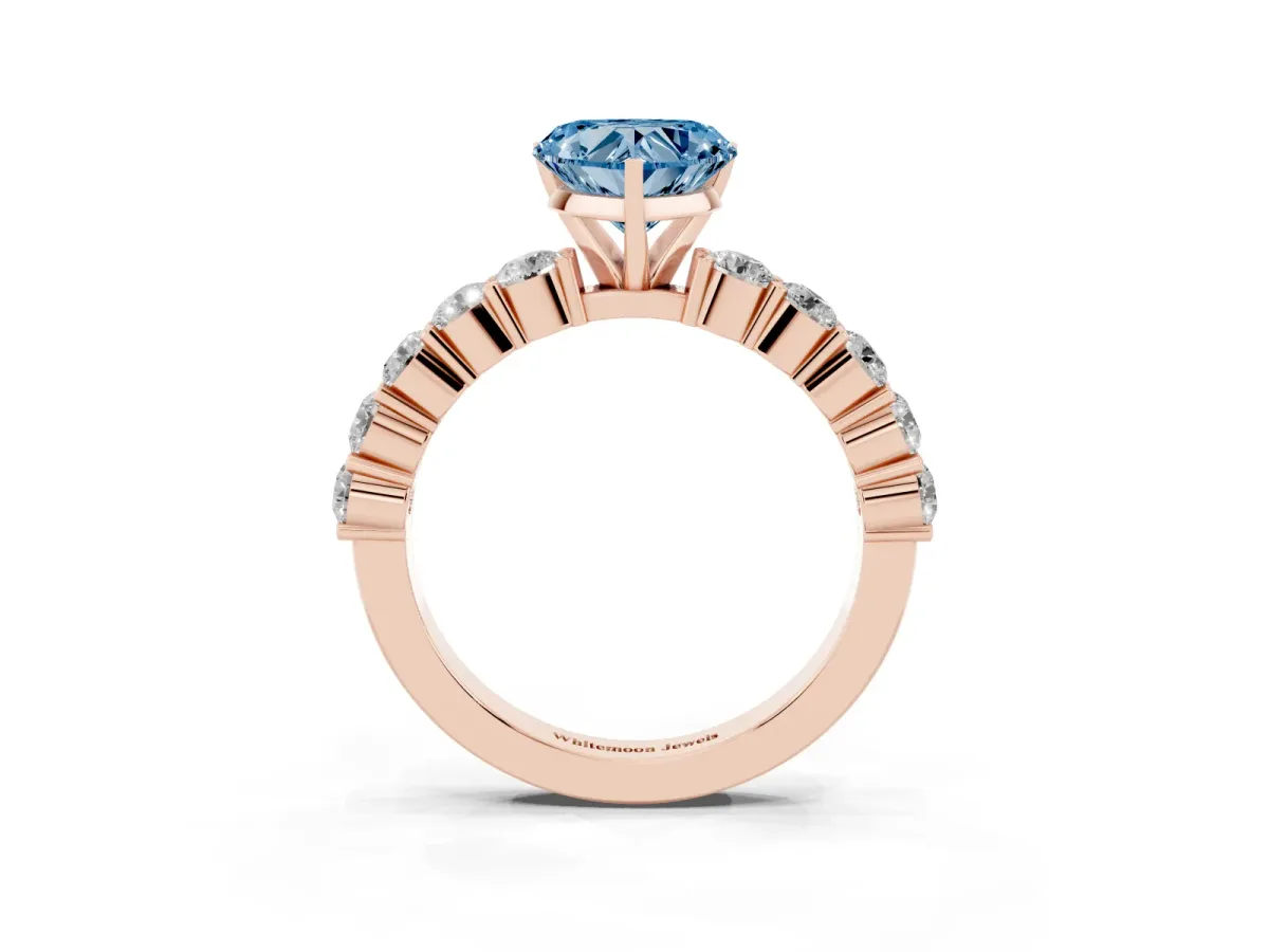 Fancy Blue Heart Cut Diamond Solitaire Ring with Shared Prong Round Side Stones Rose gold