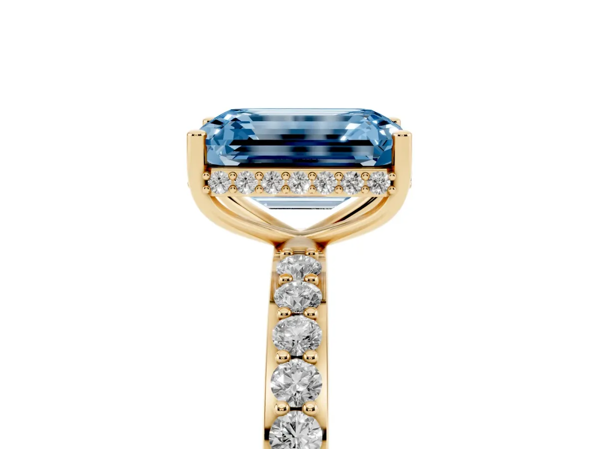 Fancy Blue Emerald Cut Diamond Solitaire Ring with Pavé Band and Hidden Halo Yellow gold