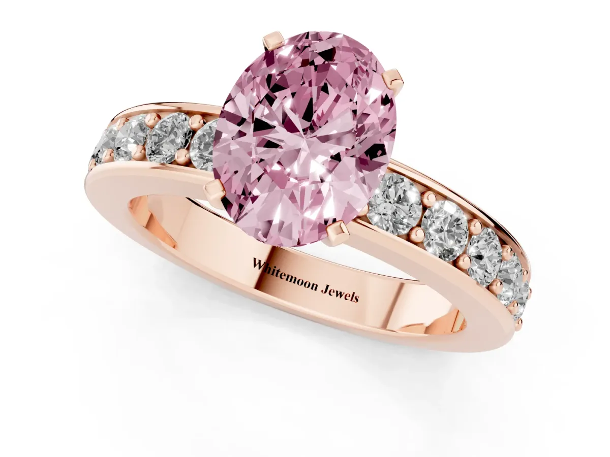 Fancy Pink Oval Cut Diamond Engagement Ring with Channel Set Round Band and Prong Setting Rose gold