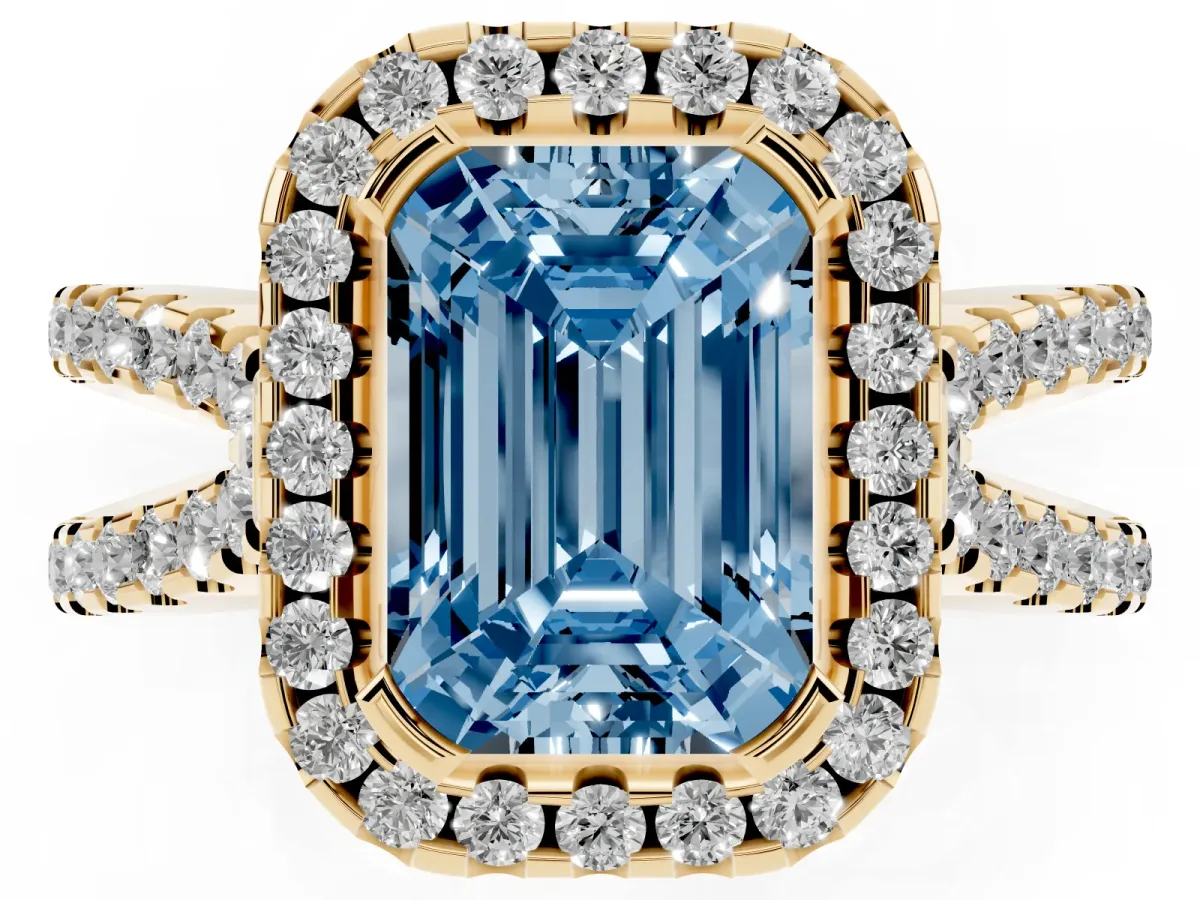Fancy Blue Emerald Cut Diamond Halo Ring with Split Shank Pavé Band and Prong Setting Yellow gold