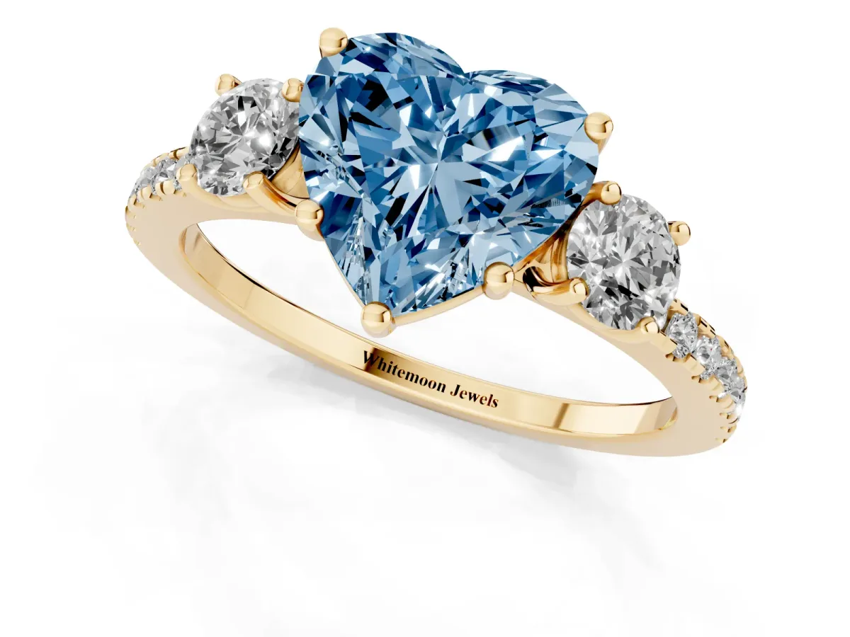 Fancy Blue Three-Stone Heart Cut Cut Diamond Pavé Band with Prong Setting Yellow gold