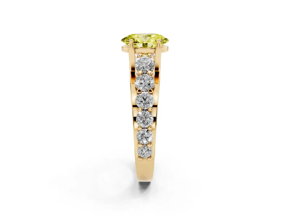 Fancy Yellow Oval Cut Diamond Engagement Ring with Pavé Band and Four-Prong Setting Yellow gold
