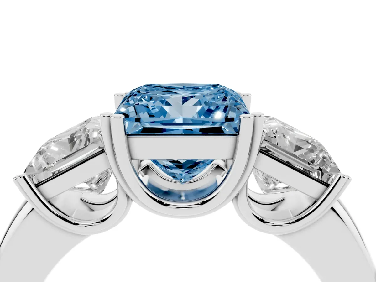 Fancy Blue Three-Stone Princess Cut Cut Diamond Ring with Channel Set Band and Four-Prong Setting Platinum