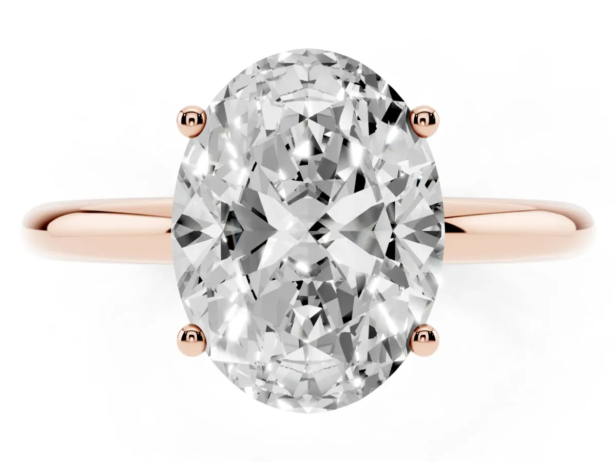 Oval Cut Cut Solitaire Engagement Ring with Four-Prong Setting and Classic Band Rose gold