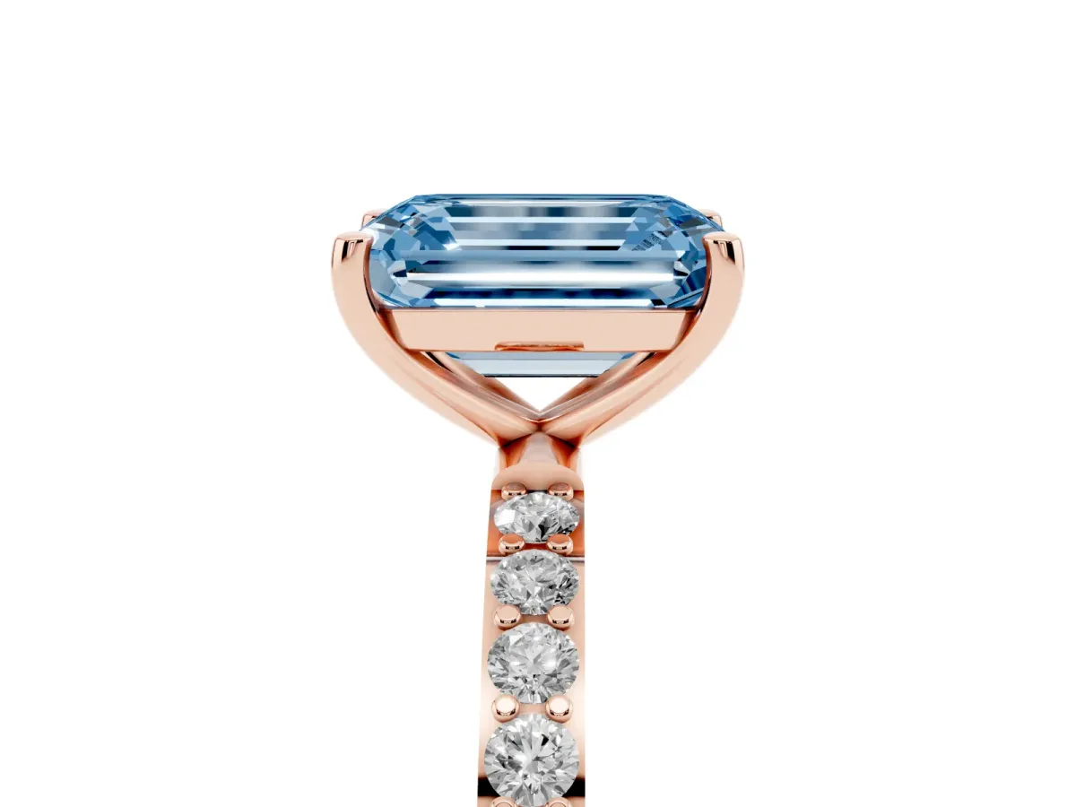 Fancy Blue Emerald Cut Diamond Solitaire Ring with Round Pavé Shoulders and Prong Setting Rose gold