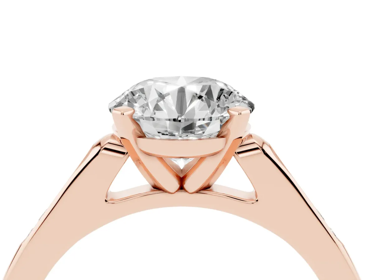 Round Cut Diamond Solitaire Ring with Channel Set Round Band and Prong Setting Rose gold