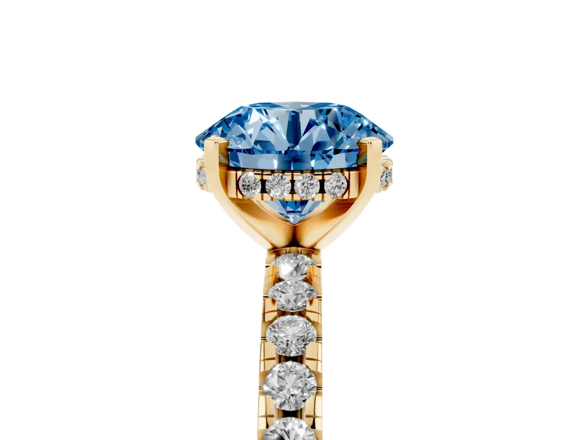 Fancy Blue Round Cut Diamond Solitaire Ring with Round Pavé Band and Four-Prong Setting Yellow gold
