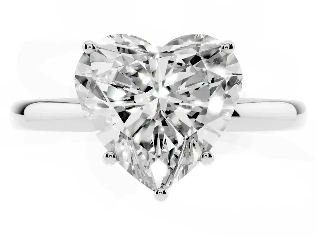 Heart Cut Solitaire Diamond Ring with Prong Setting and Plain Band Silver