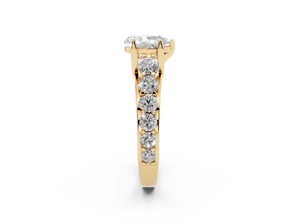 Pear Cut Diamond Engagement Ring with Pavé Band and Four-Prong Setting Yellow gold