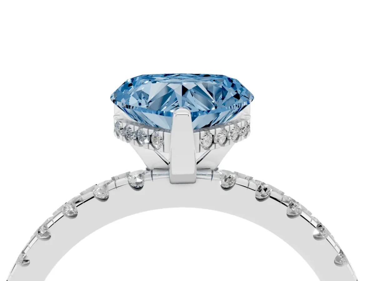 Fancy Blue Heart Cut Diamond Solitaire Ring with Round Pavé Band and Four-Prong Setting Silver