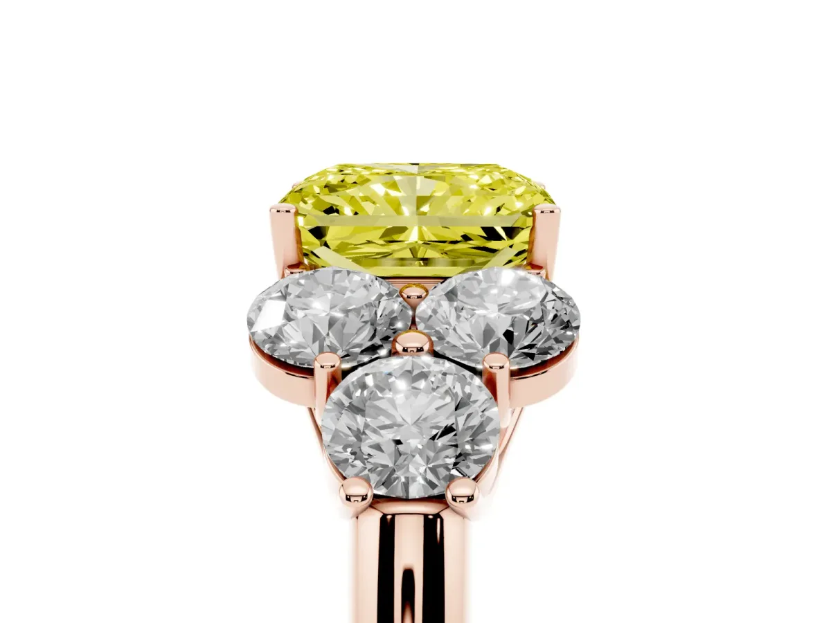 Fancy Yellow Radiant Cut Cut Diamond Cluster Ring with Round Accent Stones and Prong Setting on a Classic Band Rose gold