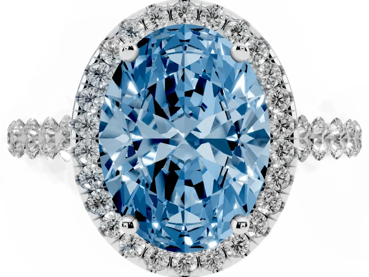 Fancy Blue Oval Cut Halo Pavé Diamond Engagement Ring with Four-Prong Setting Silver
