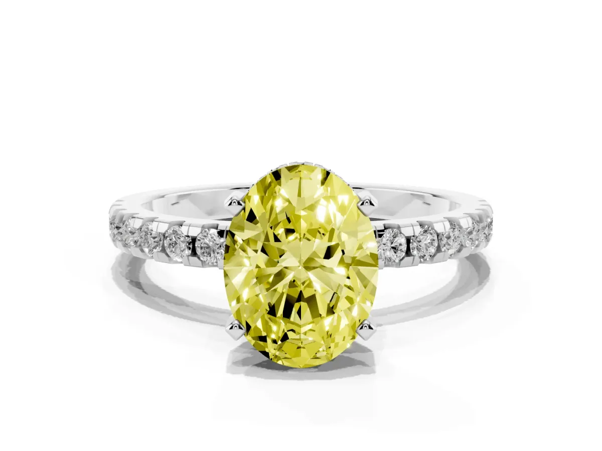 Fancy Yellow Oval Cut Diamond Solitaire Ring with Round Pavé Band and Four-Prong Setting Silver