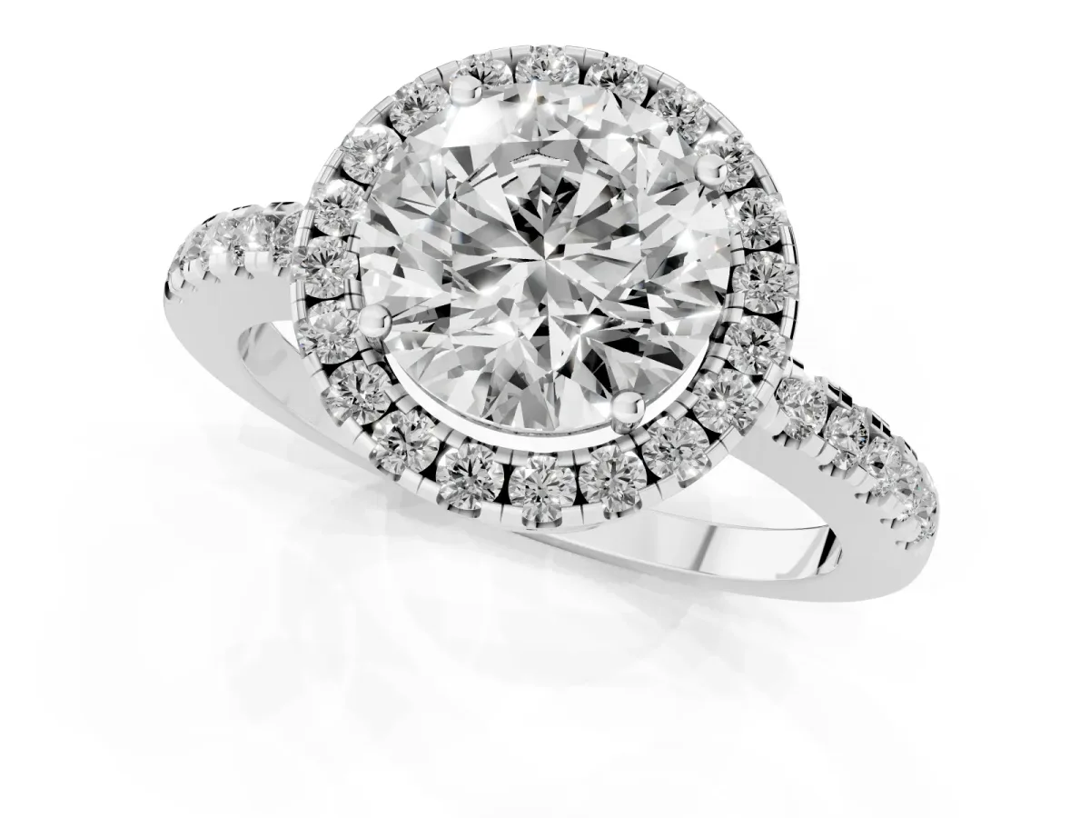 Round Cut Halo Diamond Engagement Ring with Pavé Band and Four-Prong Setting Silver