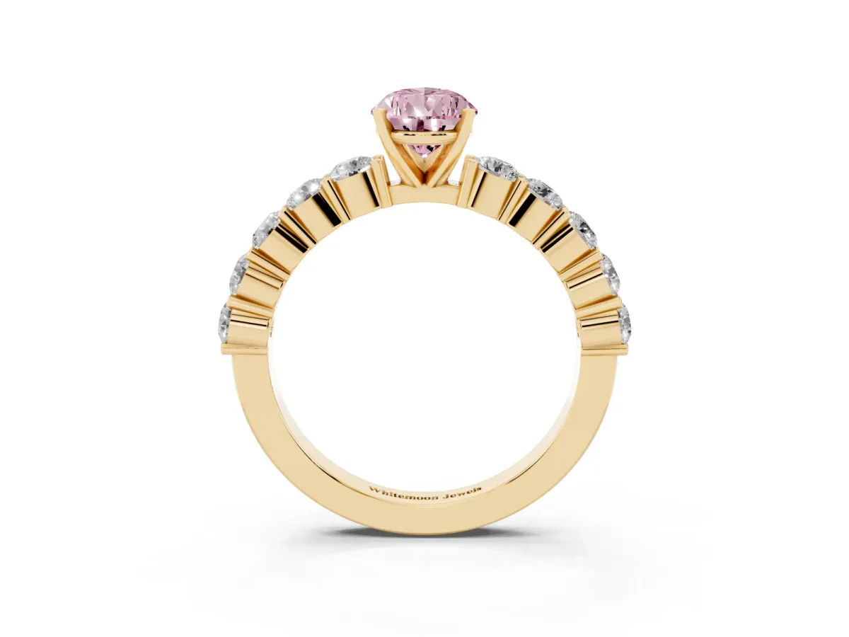 Fancy Pink Pear Cut Diamond Solitaire Ring with Shared Prong Round Side Stones Yellow gold
