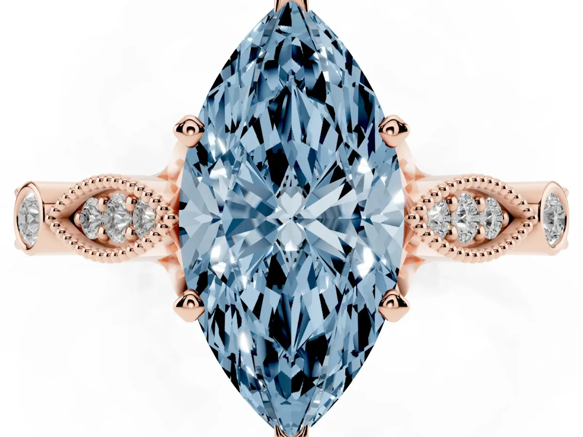 Fancy Blue Marquise Cut Cut Diamond with Milgrain Marquise and Bezel Accents on a Solitaire Band with Prong Setting Rose gold