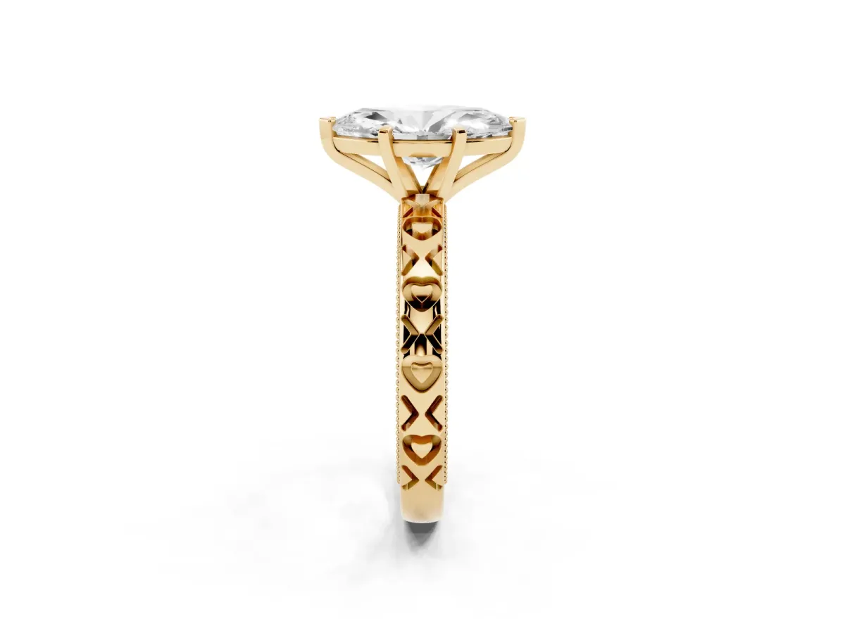 Marquise Cut Solitaire Diamond Engagement Ring with XO Engraved Band and Four-Prong Setting Yellow gold