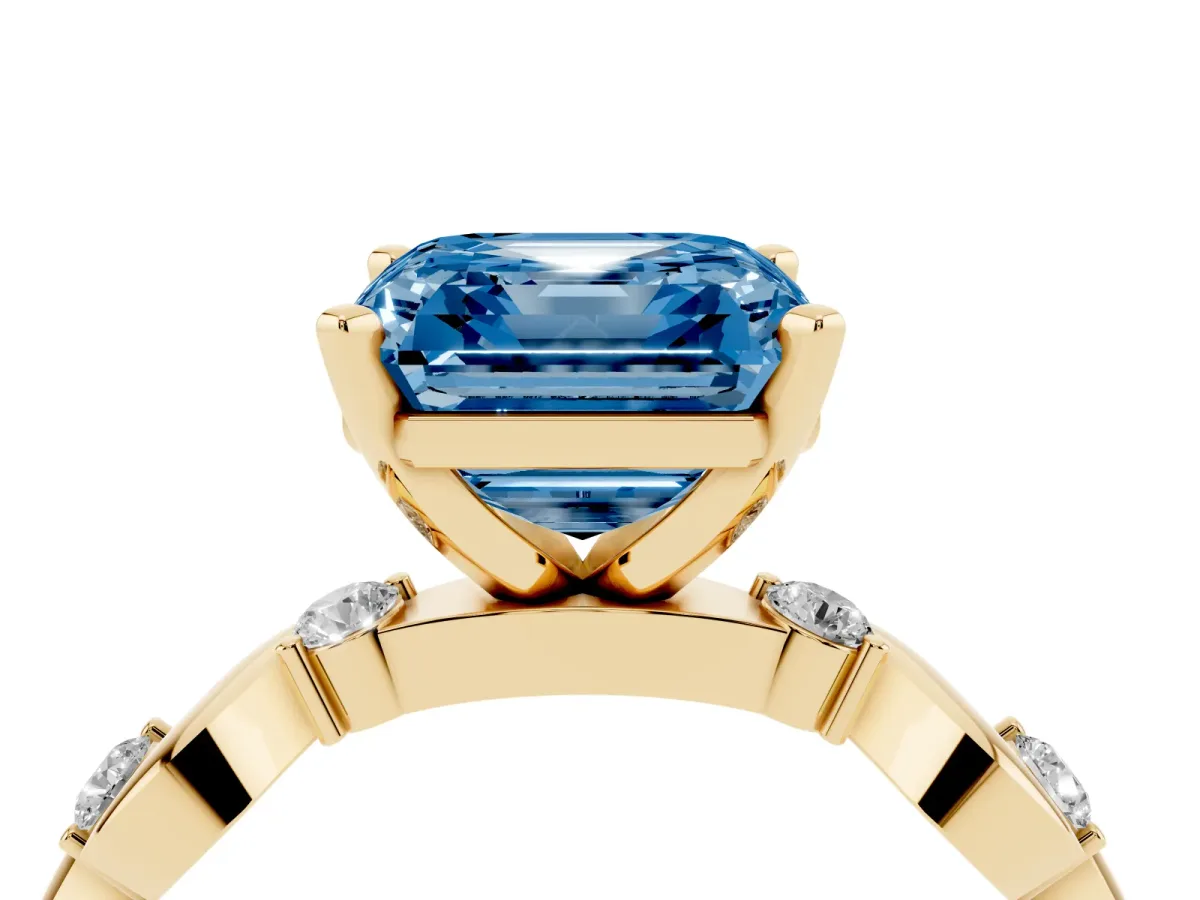 Fancy Blue Asscher Cut Diamond Solitaire Twisted Band with Round Accents and Prong Setting Yellow gold