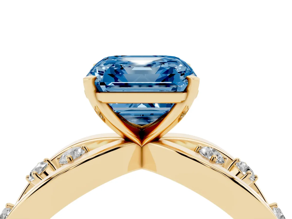 Fancy Blue Asscher Cut Cut Solitaire Diamond with Side Stones on Criss-Cross Band and Four-Prong Setting Yellow gold