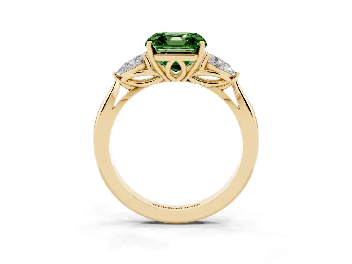 Fancy Green Three-Stone Asscher Cut Diamond Ring with Pear Side Stones in Four-Prong Setting Yellow gold