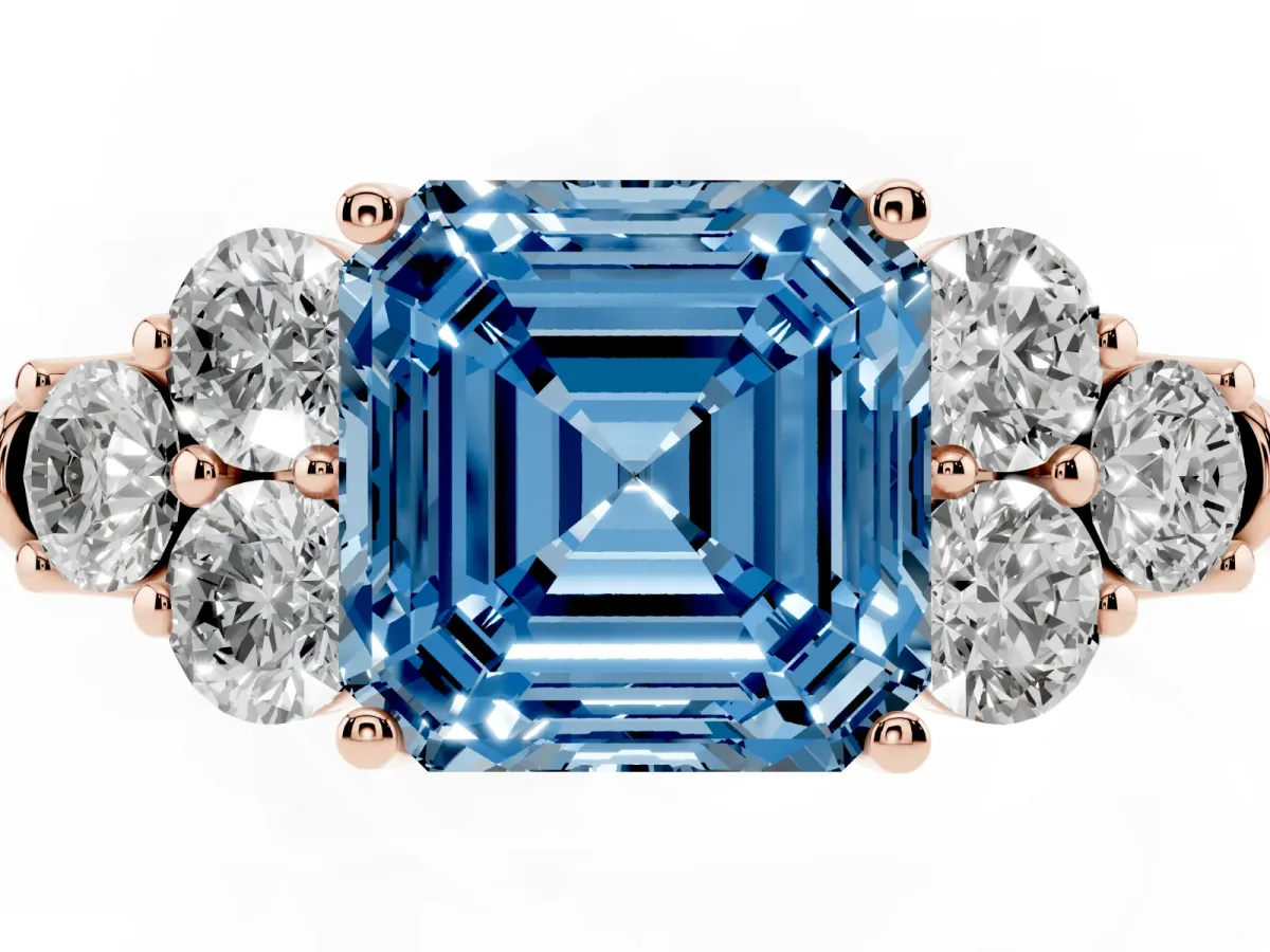Fancy Blue Asscher Cut Cut Diamond Cluster Ring with Round Accent Stones and Prong Setting on a Classic Band Rose gold