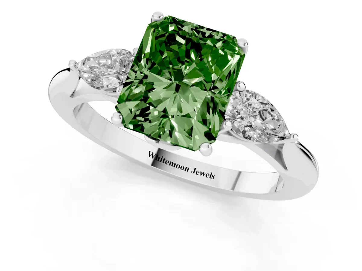 Fancy Green Three-Stone Radiant Cut Diamond Ring with Pear Side Stones in Four-Prong Setting Silver