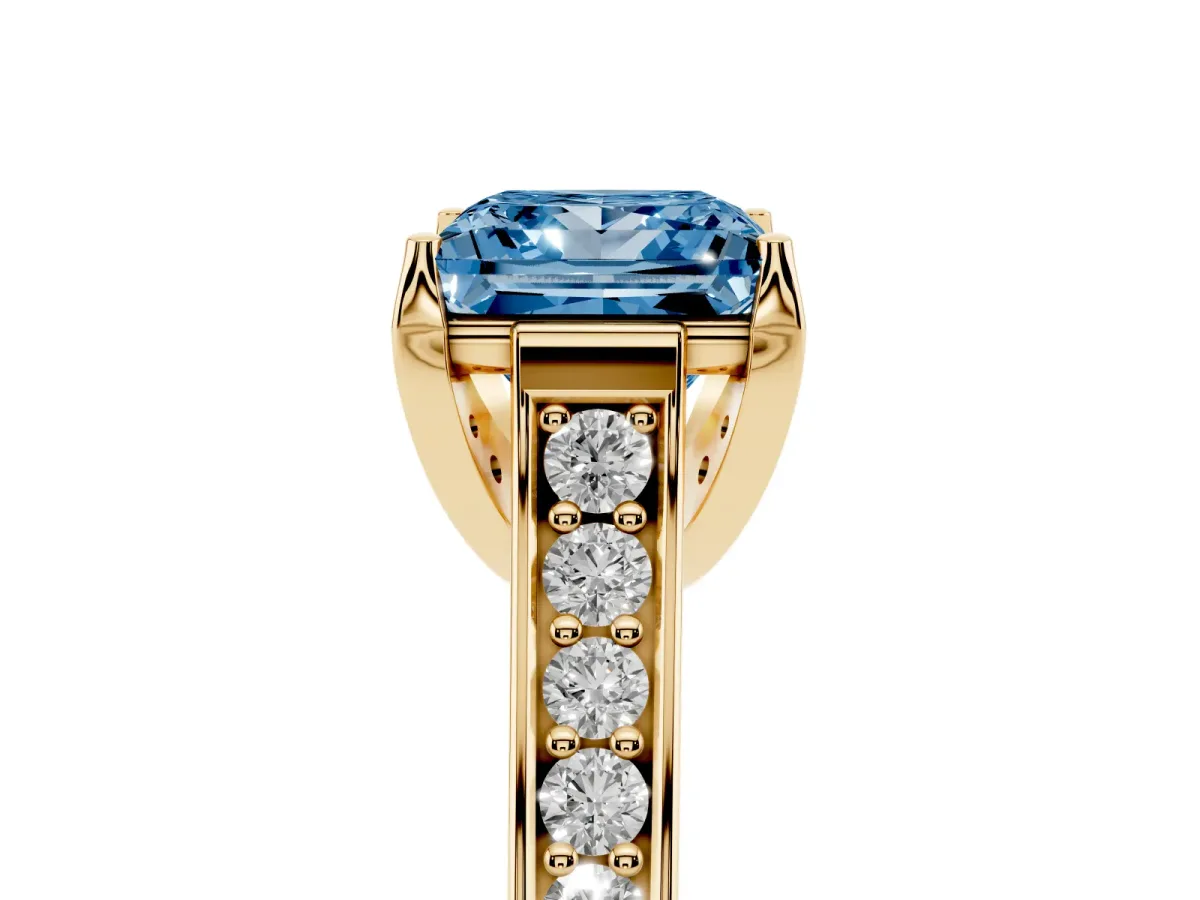 Fancy Blue Princess Cut Brilliant Cut Diamond Engagement Ring with Pavé Band and Four-Prong Setting Yellow gold