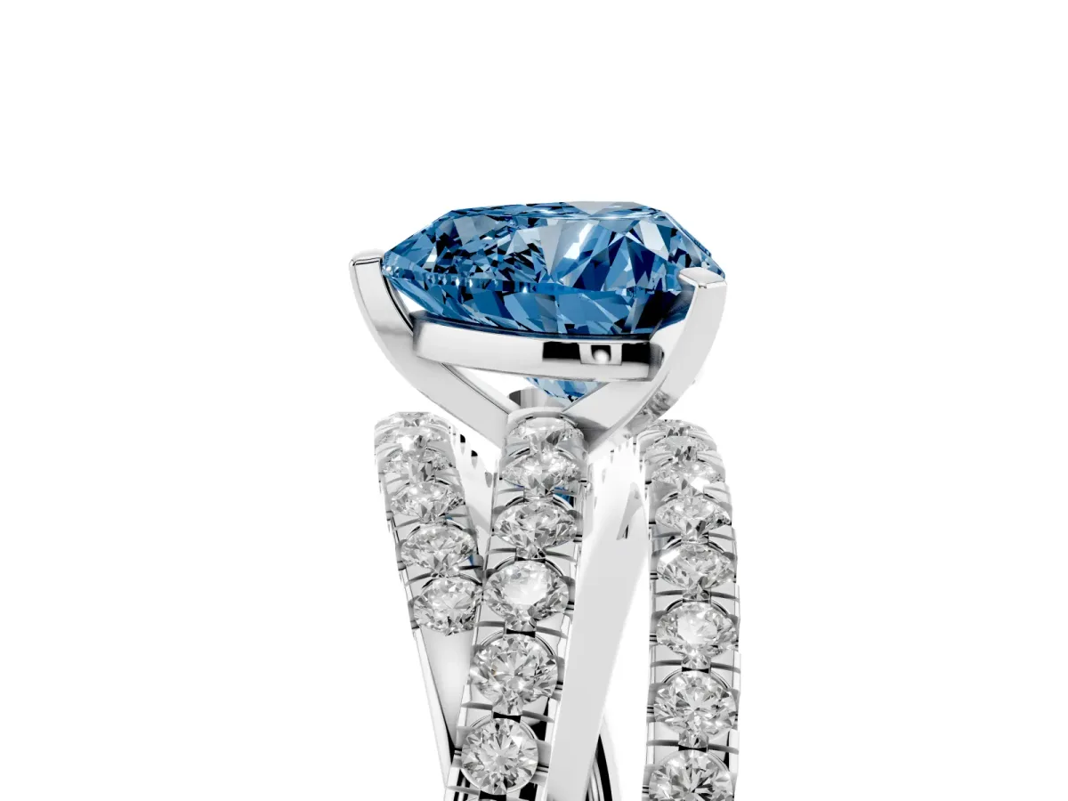 Fancy Blue Heart Cut Solitaire Twist Band with Pavé Setting and Four-Prong Setting Silver