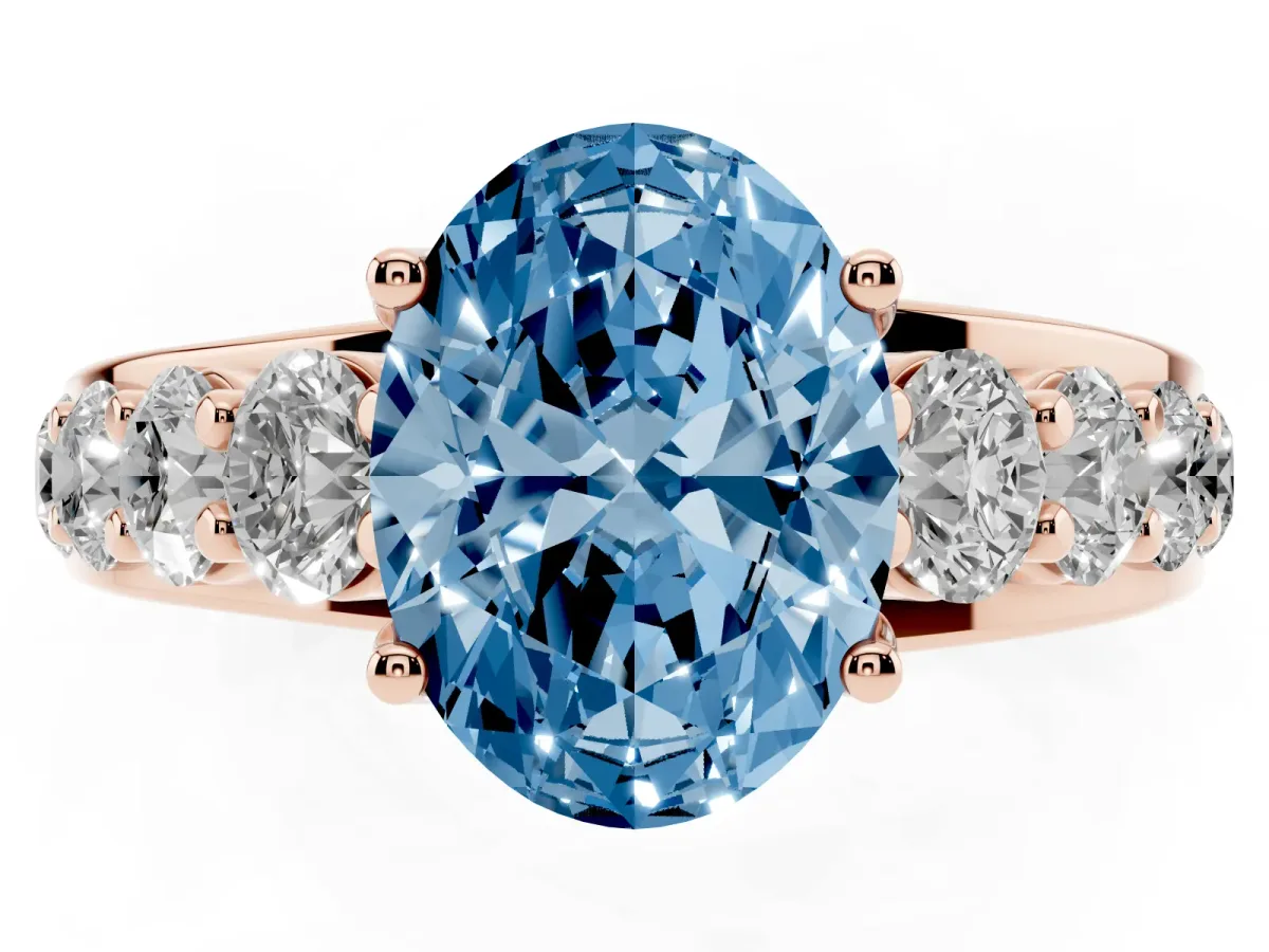Fancy Blue Oval Cut Diamond Engagement Ring with Pavé Band and Four-Prong Setting Rose gold