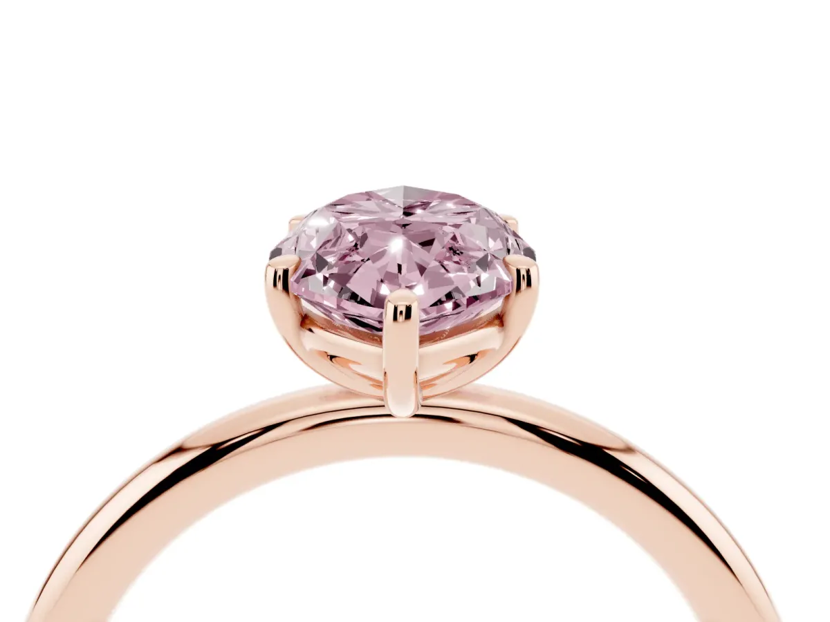 Fancy Pink Marquise Cut Solitaire Diamond Ring with Four-Prong Setting on a Plain Band Rose gold