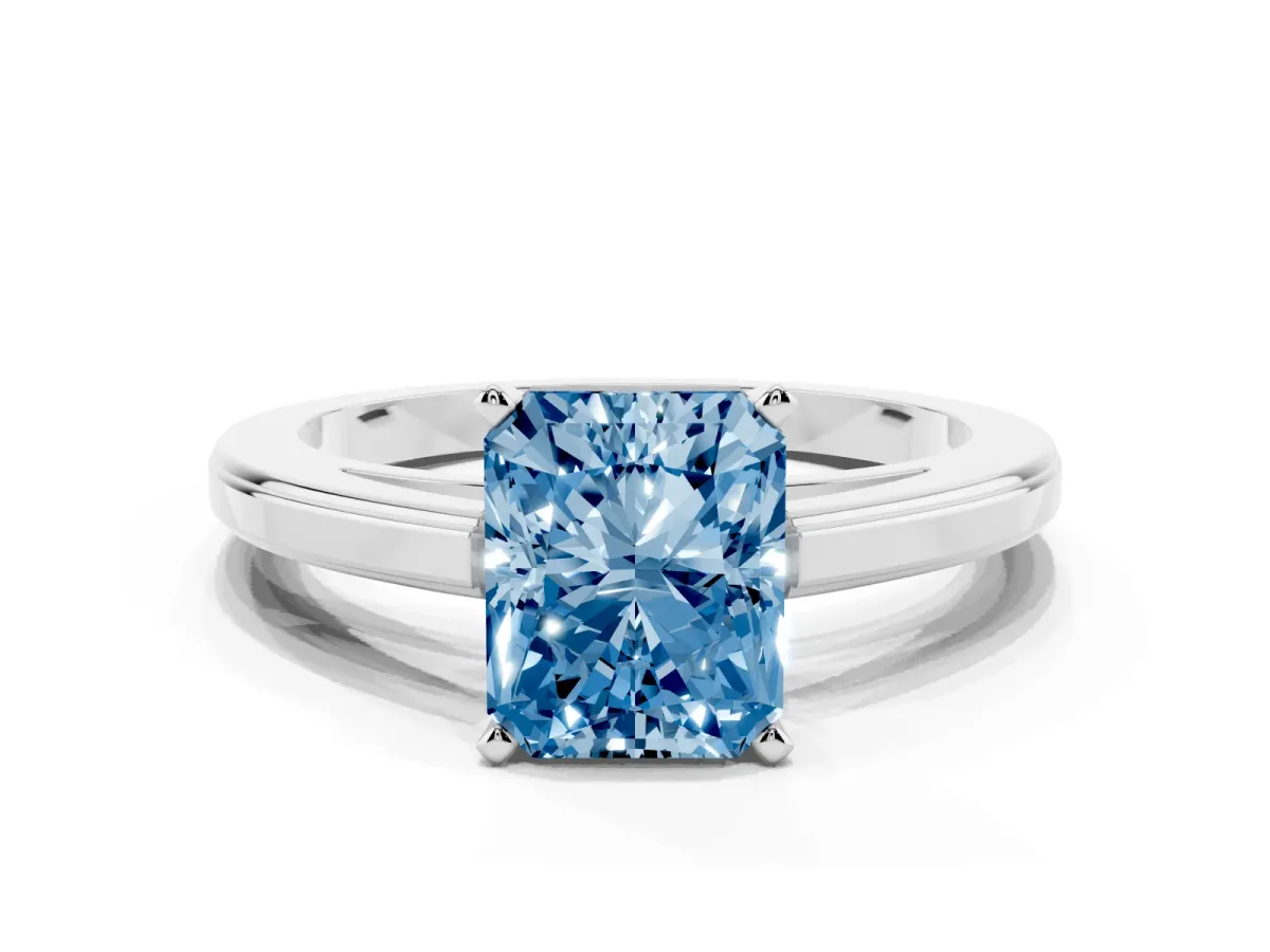 Fancy Blue Radiant Cut Solitaire Diamond Ring with Four-Prong Setting and Classic Band Platinum