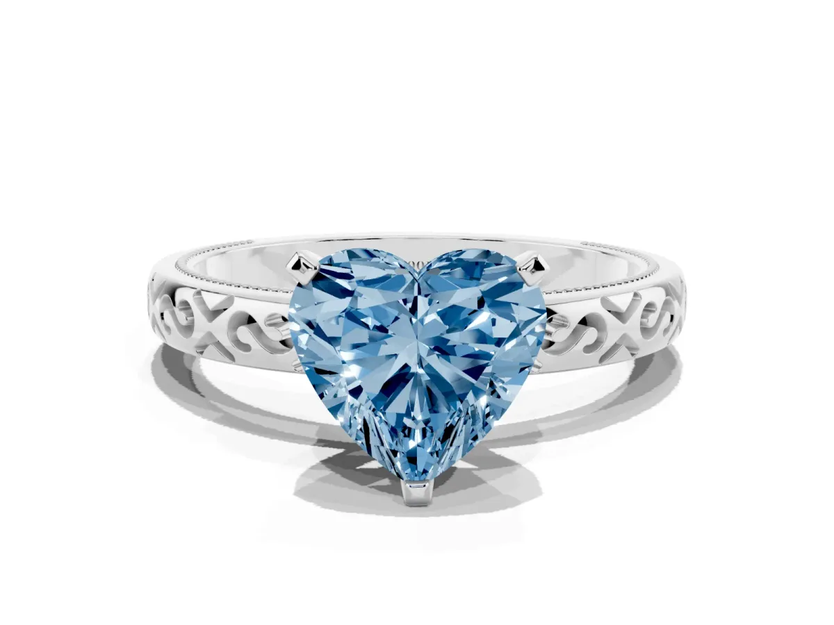Fancy Blue Heart Cut Solitaire Engagement Ring with Scrollwork Band and Four-Prong Setting White gold