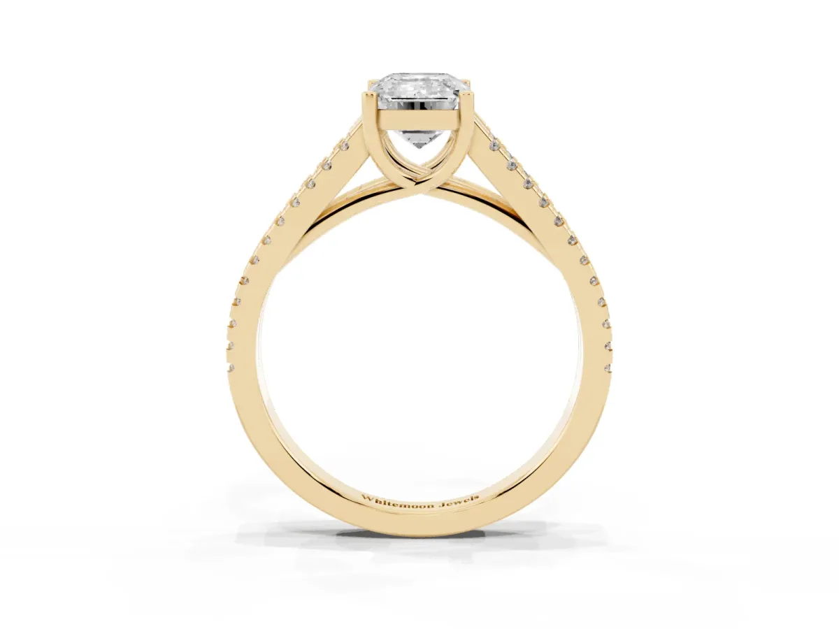 Emerald Cut Diamond Solitaire Engagement Ring with Split Shank Pavé Band Yellow gold