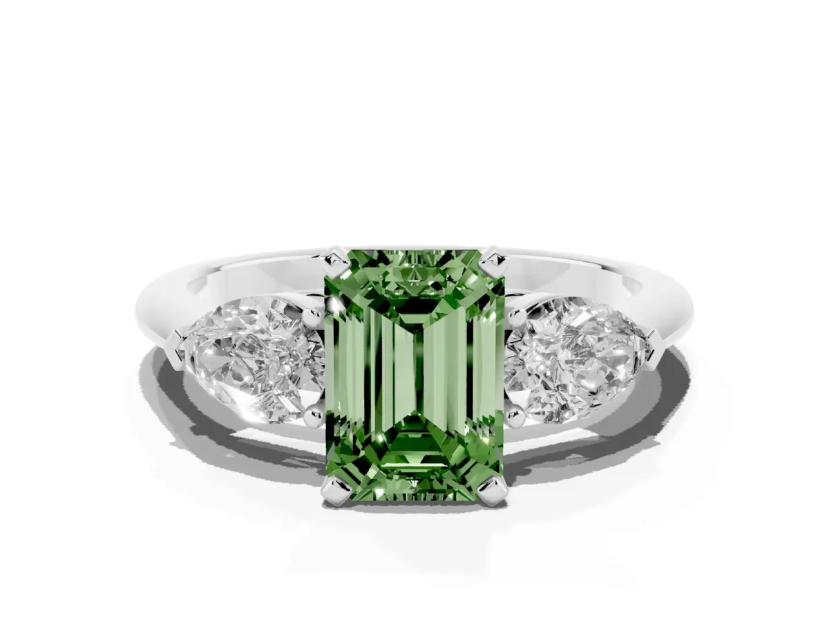Fancy Green Three-Stone Emerald Cut Diamond Ring with Pear Side Stones and Four-Prong Setting Silver