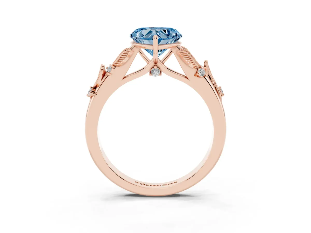 Fancy Blue Heart Cut Diamond Solitaire Ring with Leaf Motif Band and Four-Prong Setting Rose gold