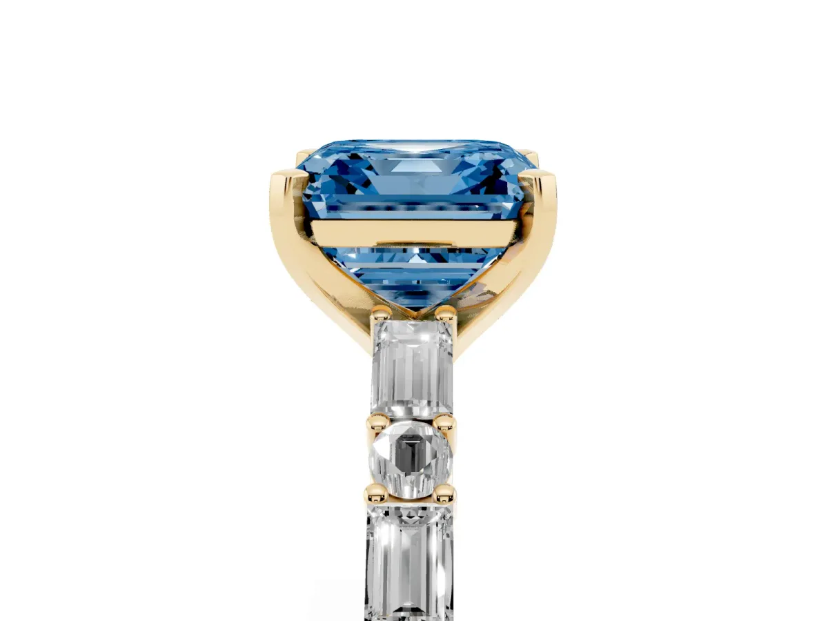 Fancy Blue Asscher Cut Diamond Solitaire with Side Baguettes and Channel Set Band Yellow gold