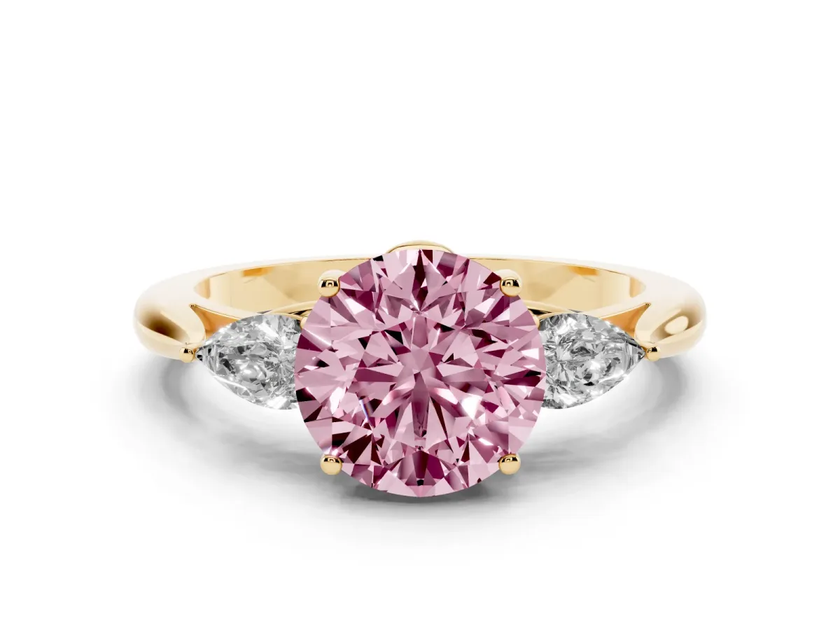 Fancy Pink Round Cut Diamond Three-Stone Ring with Pear Side Stones and Prong Setting Yellow gold