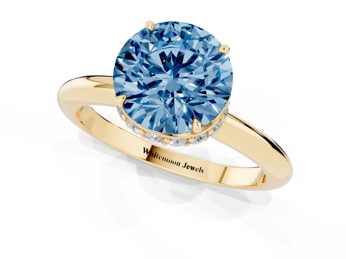 Fancy Blue Round Cut Brilliant Solitaire Engagement Ring with Six-Prong Setting and Classic Band Yellow gold