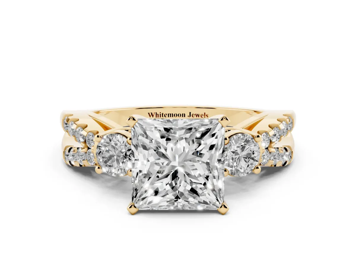 Princess Cut Diamond Three-Stone Ring with Pavé Split Shank and Four-Prong Setting Yellow gold