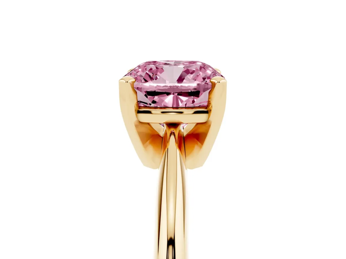 Fancy Pink Cushion Cut Cut Solitaire Ring with Four-Prong Setting on a Classic Band Yellow gold