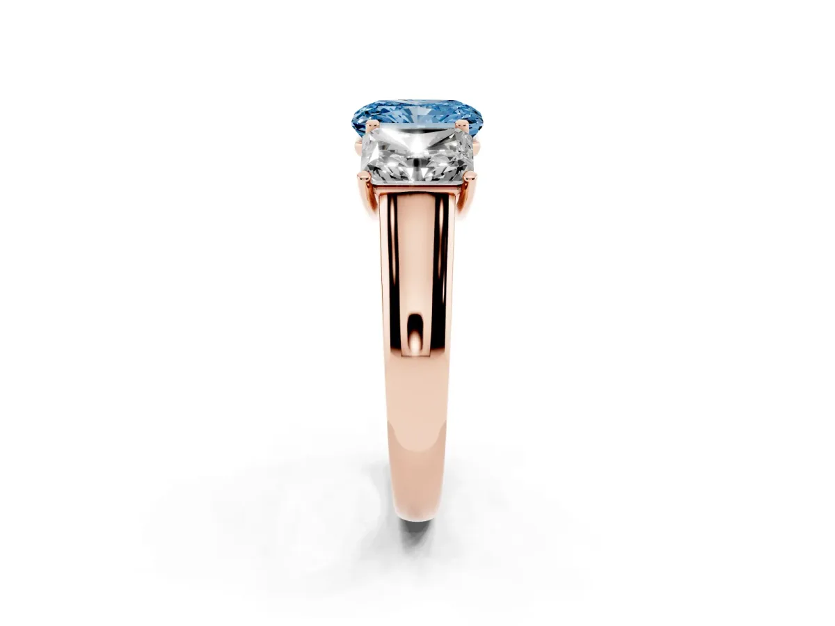 Fancy Blue Radiant Cut Three-Stone Diamond Ring with Prong Setting on a Classic Band Rose gold