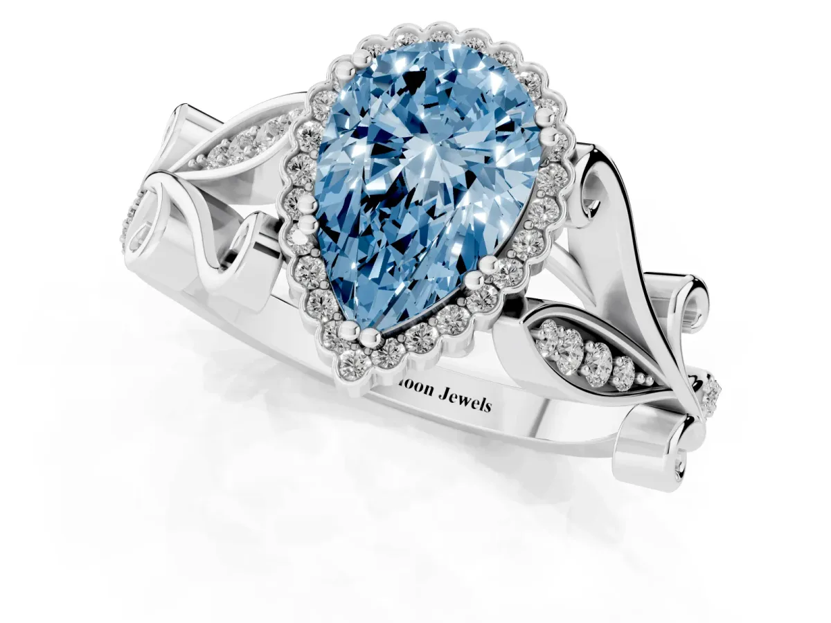 Fancy Blue Pear Cut Diamond Halo Ring with Vintage Split Shank and Four-Prong Setting Silver
