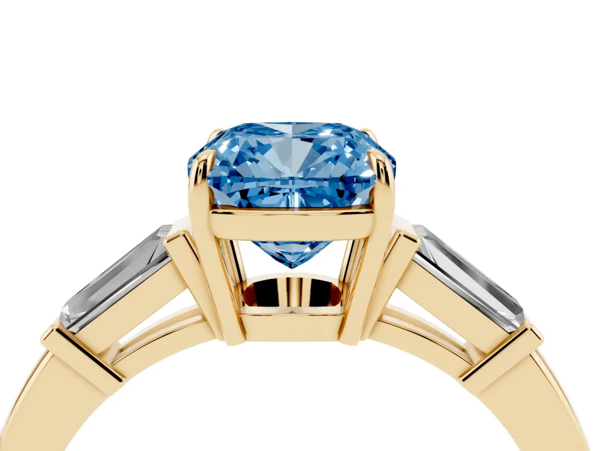 Fancy Blue Cushion Cut Diamond Three-Stone Ring with Tapered Baguette Side Stones and Prong Setting Yellow gold