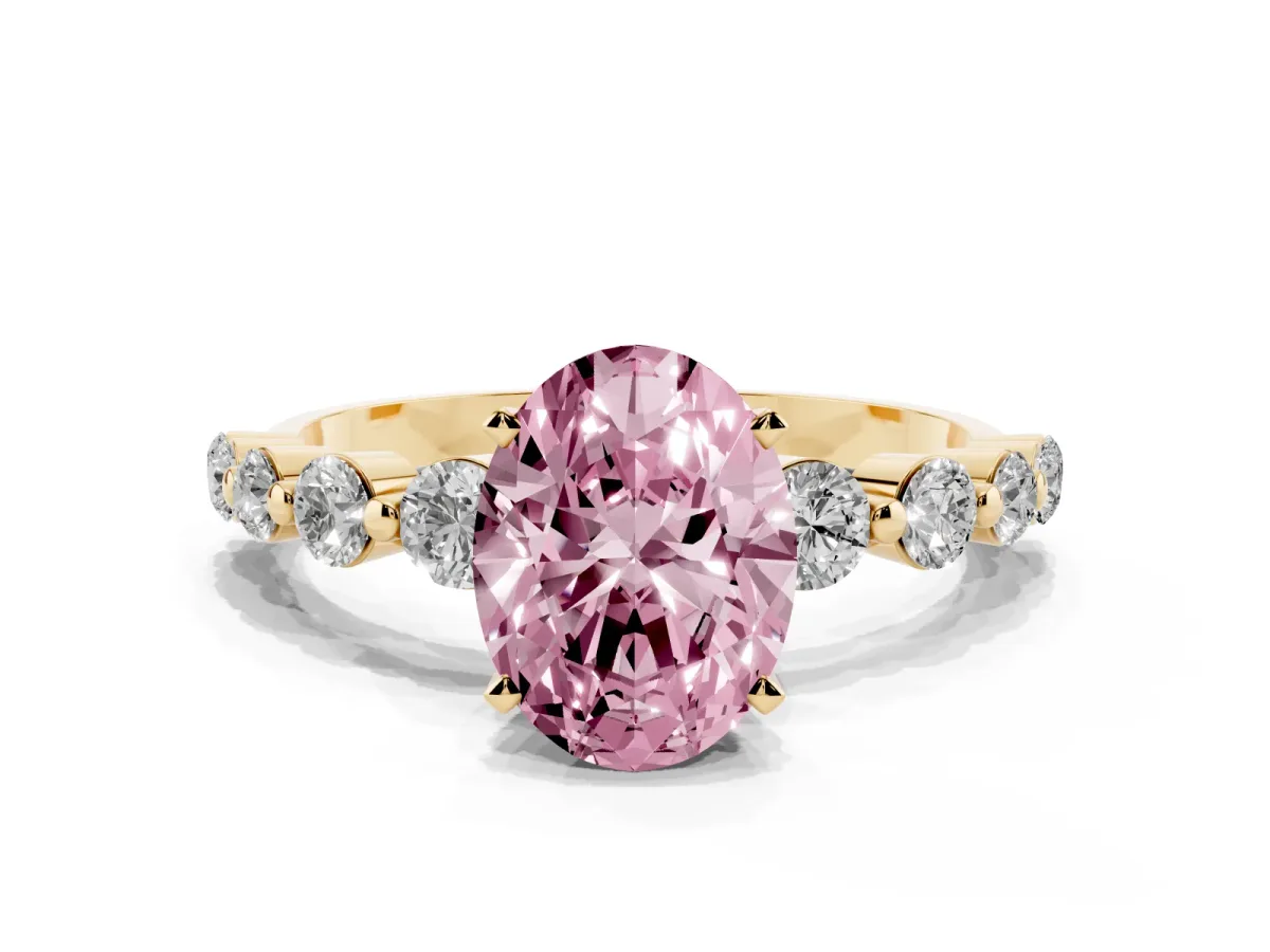 Fancy Pink Oval Cut Solitaire Diamond Ring with Pave Band and Four-Prong Setting Yellow gold