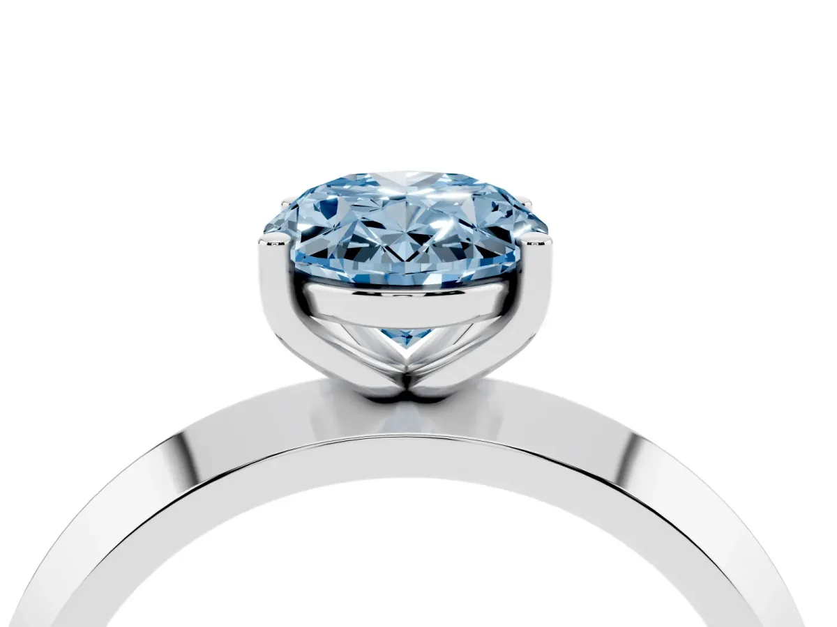 Fancy Blue Oval Cut Cut Solitaire Engagement Ring with Flat Band and Four-Prong Setting Platinum